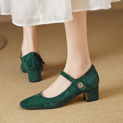 Women's dark green suede Mary Jane shoes with a chunky heel and square toe.