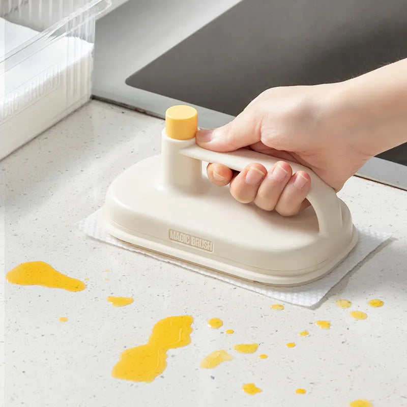 Magic disposable cleaning brush with handle, storage box, and pack of 50 white non-woven cloths for bathroom and kitchen cleaning.