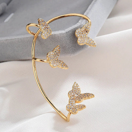 Elegant gold-plated butterfly ear cuffs with sparkling zircon accents, perfect for women's fashion and accessorizing