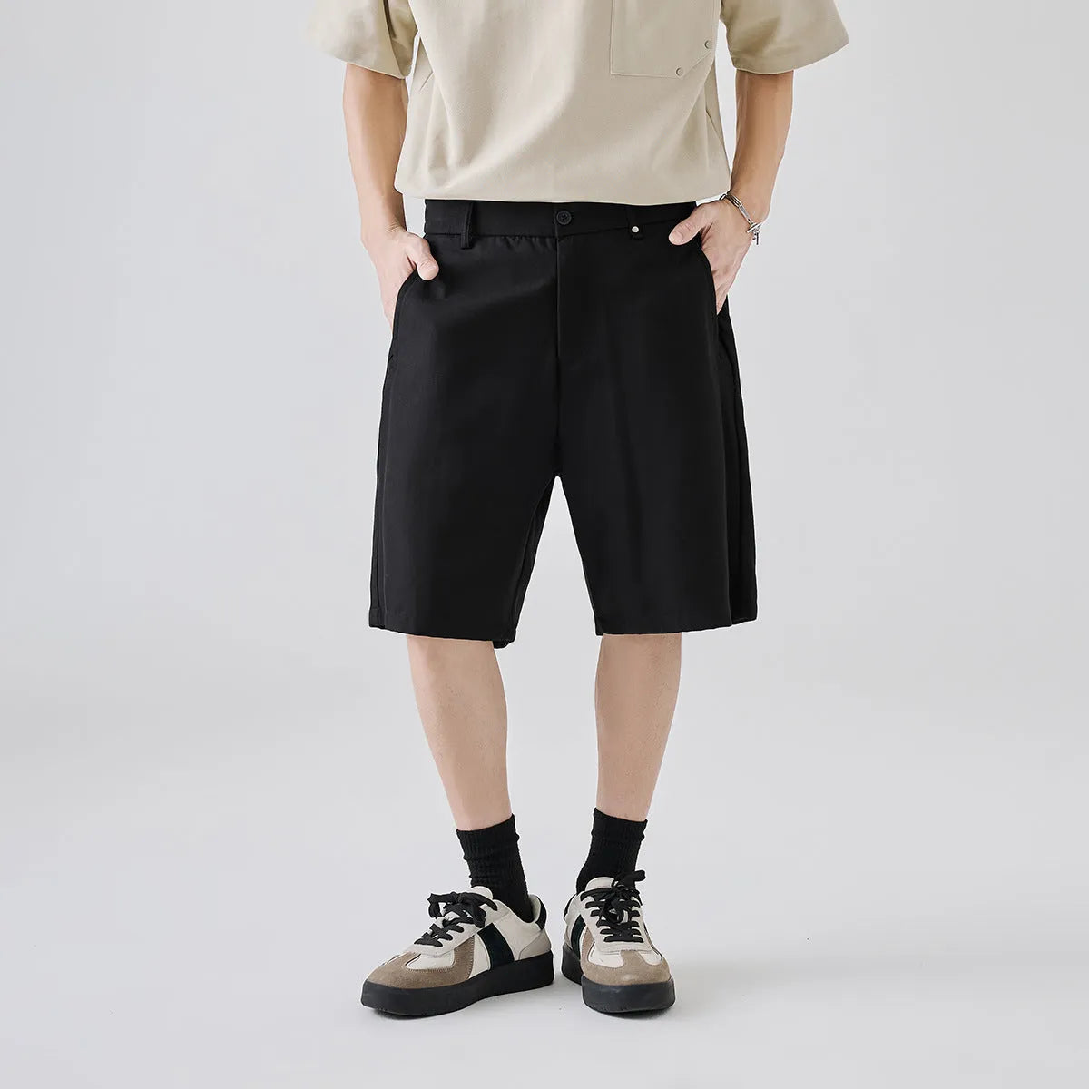 Men's loose-fitting lyocell cotton blend casual shorts in apricot, dark grey, and black colours