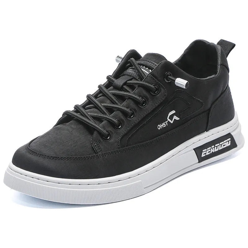 Gray men's canvas casual shoes with ice silk construction, leather lining, and rubber sole in low top design