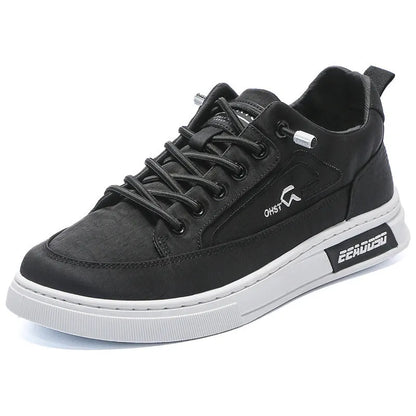 Gray men's canvas casual shoes with ice silk construction, leather lining, and rubber sole in low top design
