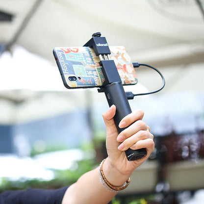 Black aluminium alloy power bank with a built-in carrying handle, shown with dimensions.