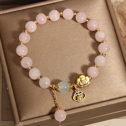 Women's pink crystal flower bracelet with adjustable sizing and refined grace floral design