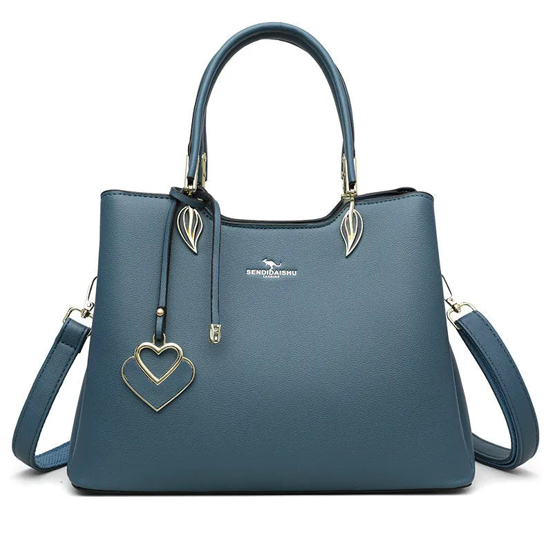 Black women's multi-layer PU leather shoulder messenger bag with sewing thread detail.