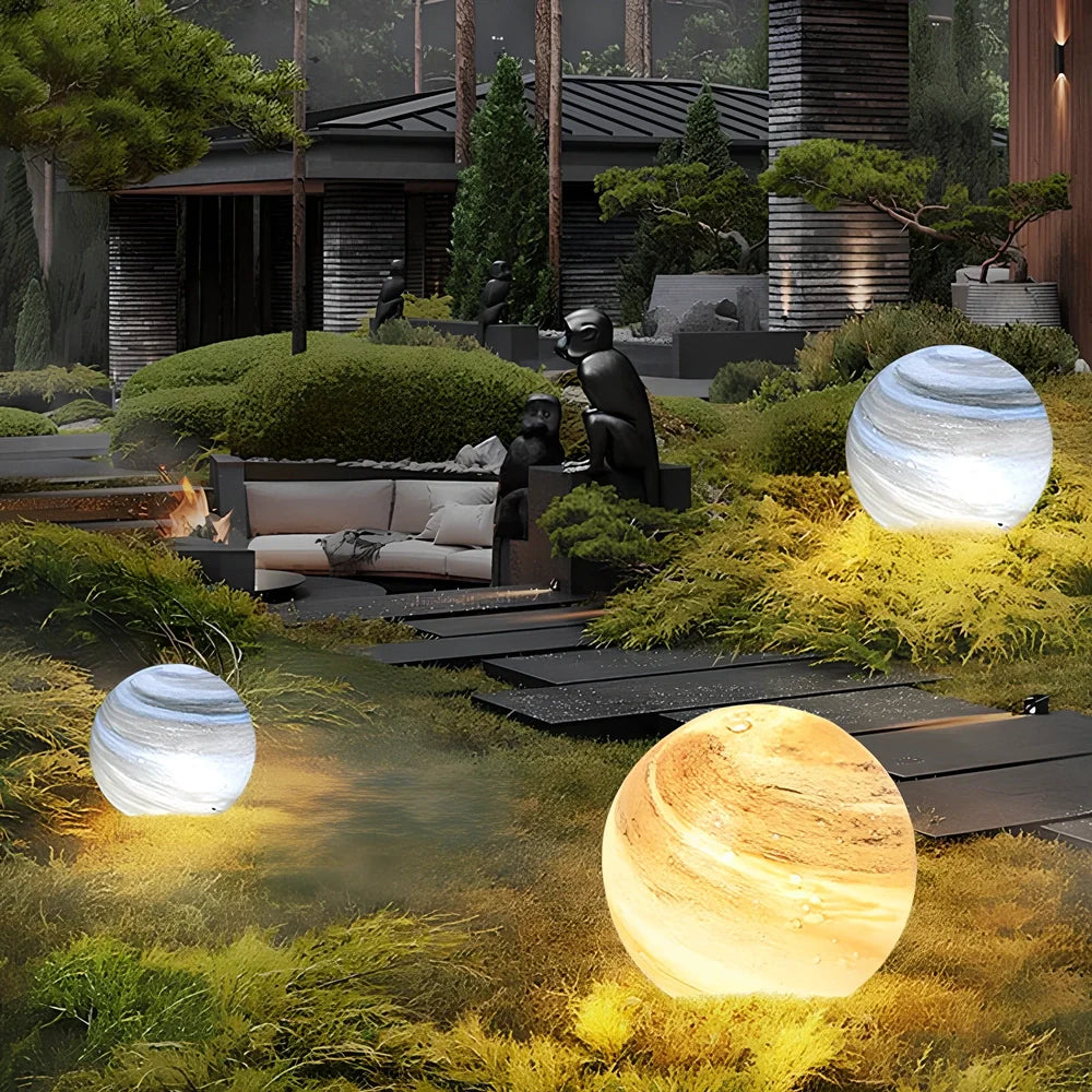Solar lawn lamp in garden setting showing waterproof construction and LED illumination