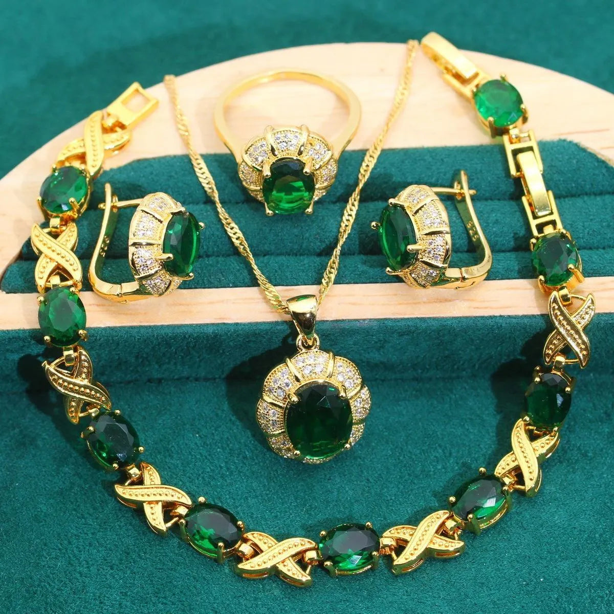 18k gold plated jewellery set with multi-colour zircon stones showing necklace, earrings, ring, and bracelet