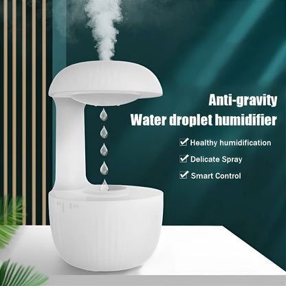 White anti-gravity humidifier showing water droplets appearing to levitate upwards from its base
