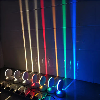 Aluminium LED spotlight bar wall lamp with glass lens, shown in a corridor setting.