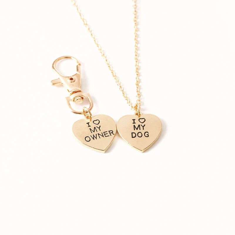 Stylish dog bone necklace for pet lovers, available in silver and gold.