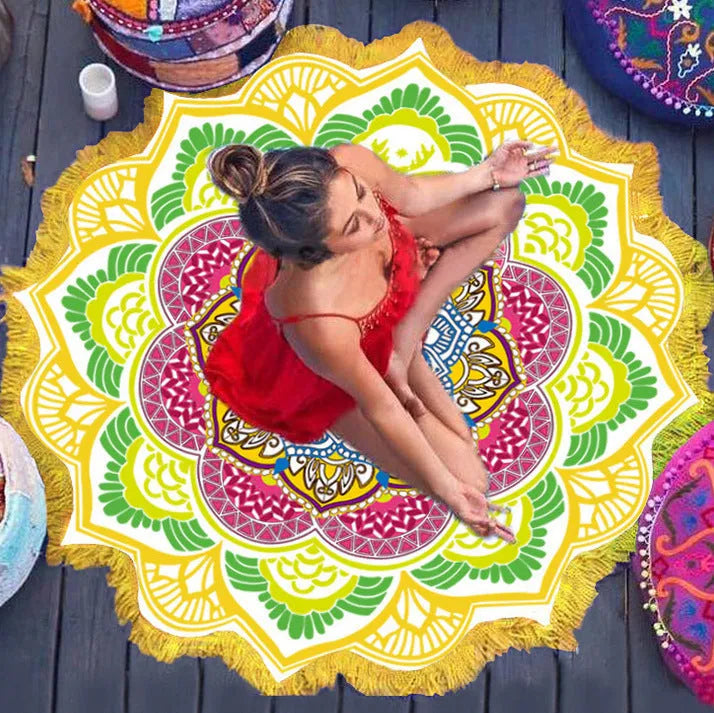 Round floor mat with polygon print and tassel trim, shown in available colours.
