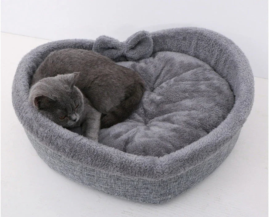 Cozy heart-shaped pet bed in grey and pink colors, suitable for small, medium, and large dogs and cats