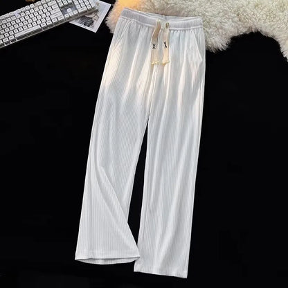 Men's cotton casual trousers with ice silk thread in loose straight cut, white or black colour options