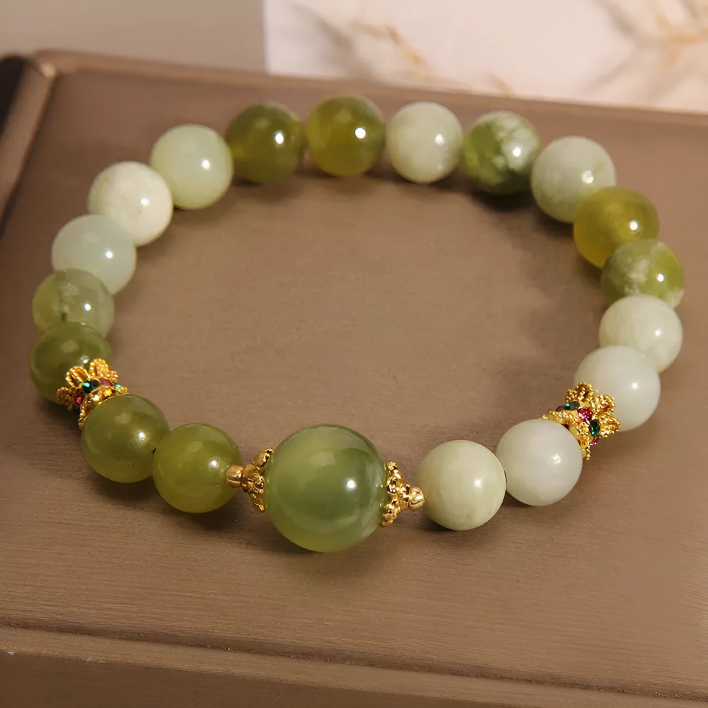 Original design jade bracelet in Xiuyan jade green colour, women's light luxury sweet Mori style jewellery.