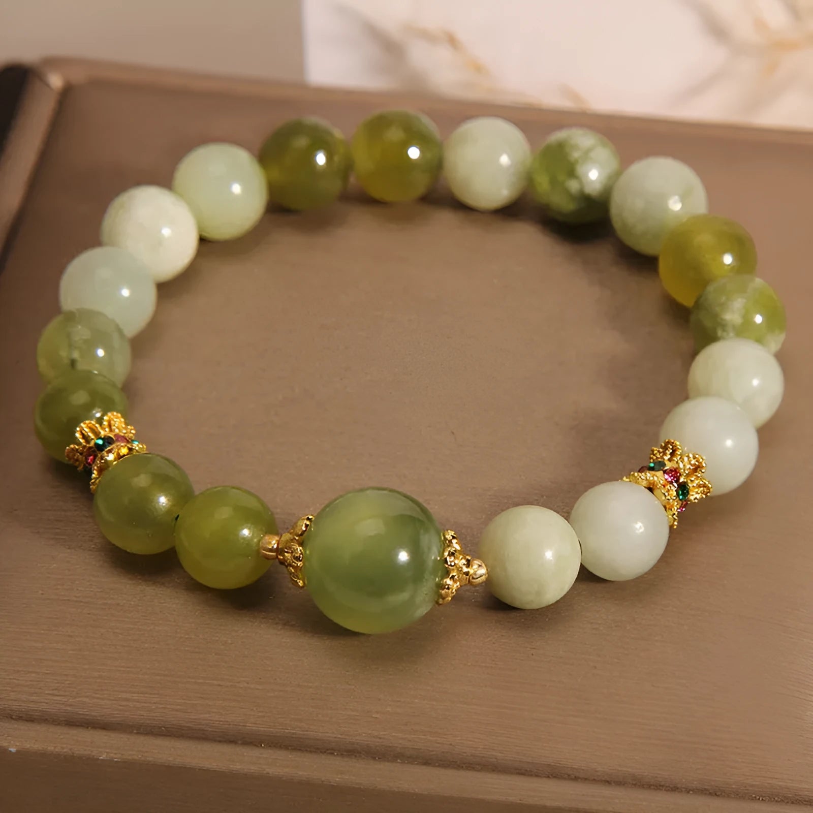 Original design jade bracelet in Xiuyan jade green colour, women's light luxury sweet Mori style jewellery.