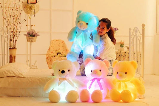 Illuminating plush teddy bear with color-changing LED lights, soft and huggable design in various sizes and colors