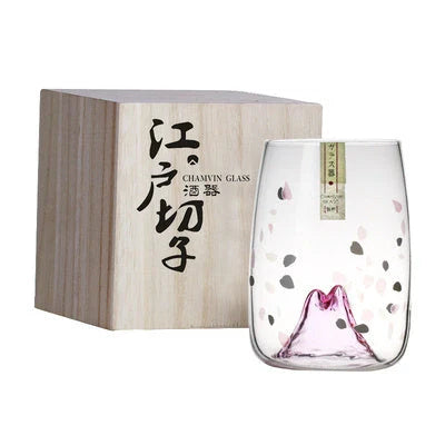 Elegant Japanese crystal glass tumbler with intricate cherry blossom design, perfect for enjoying whisky, spirits, and cocktails