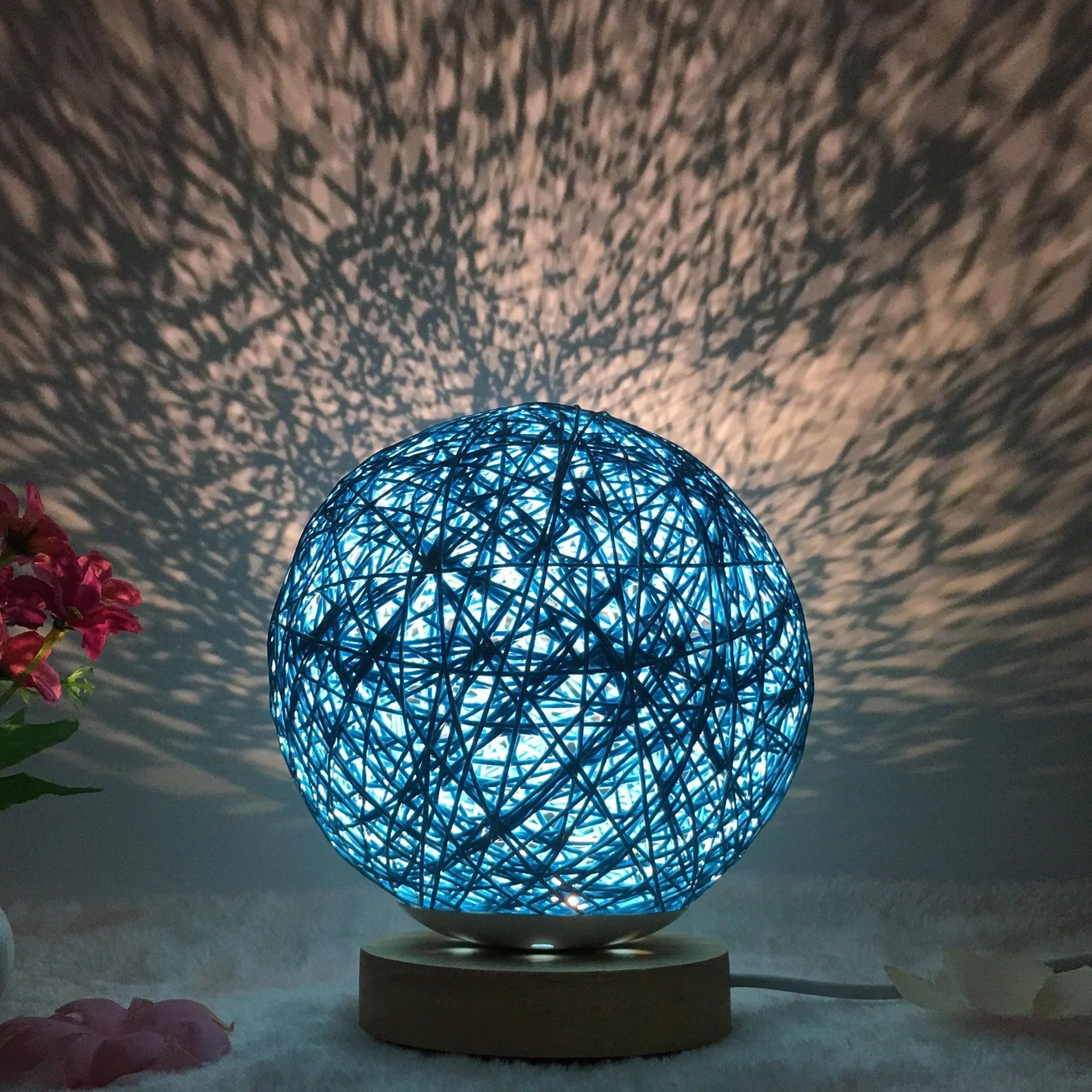 LED rattan table lamp with hand-knit linen shade in various colours