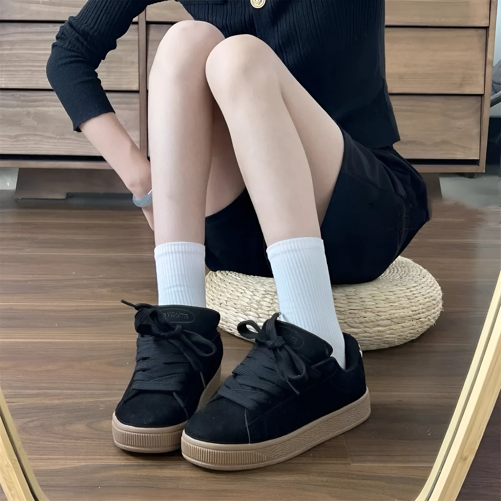 Black retro low-top sneakers with artificial PU upper, round toe and lace-up front closure on rubber sole