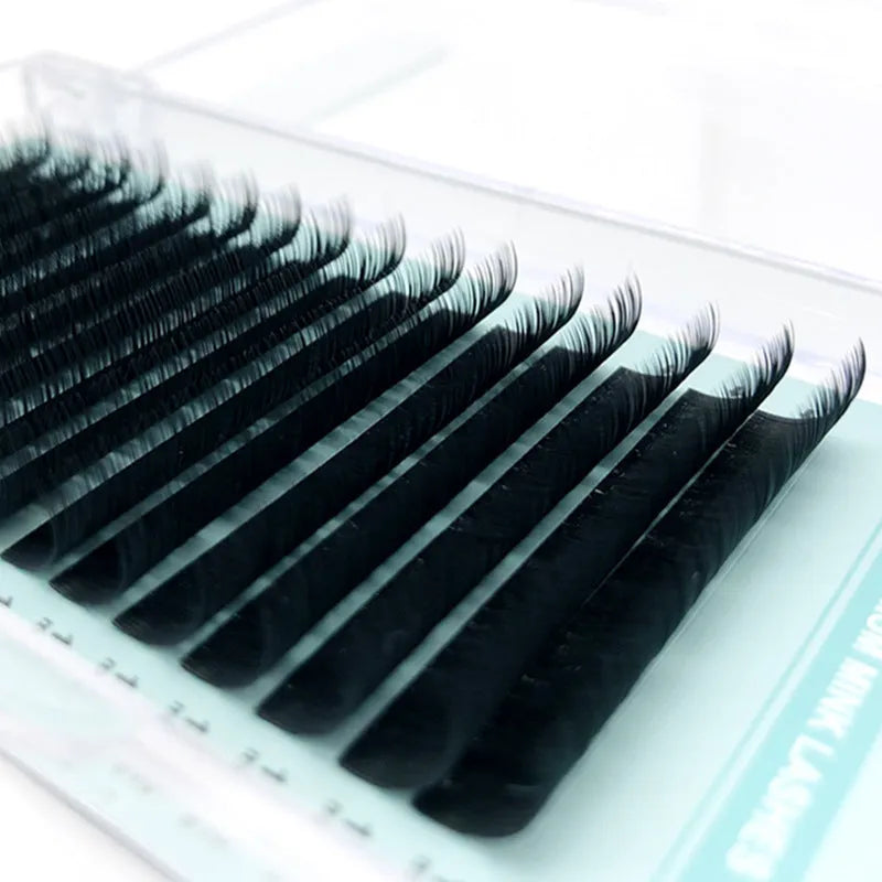 Soft velvet false eyelashes showing artificial fibre construction in various lengths from 7mm to 15mm
