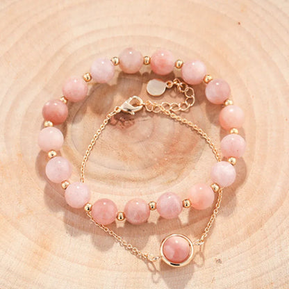 Double-layer women's bracelet with lucky beads and colourful crystals in gold-toned setting