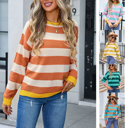Women's loose blue striped acrylic sweater with long sleeves and round neck.