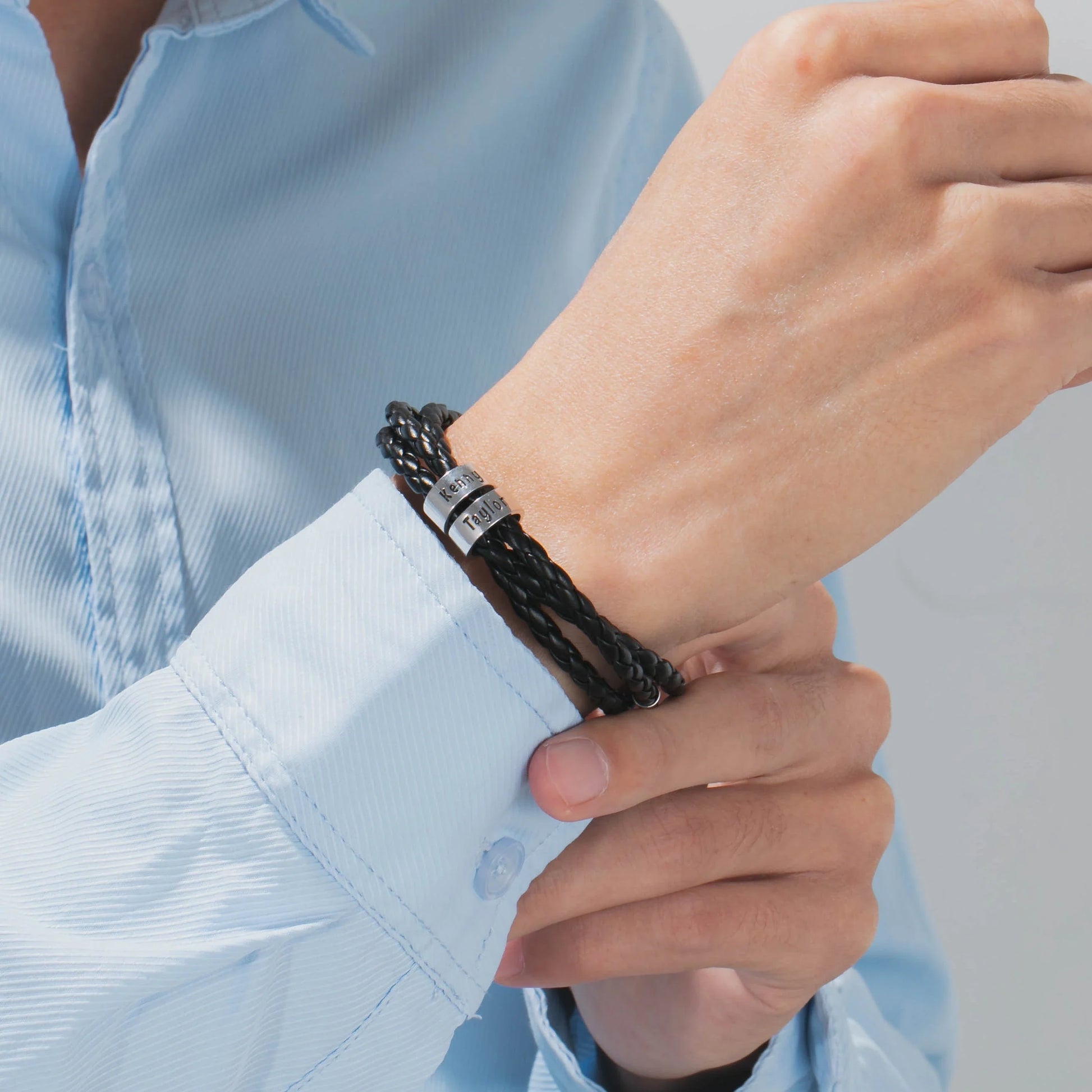 A personalized leather bracelet with engraved beads, a thoughtful gift for men