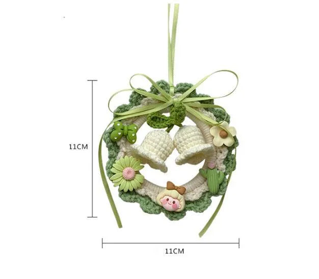 Woven finished bell orchid car pendant is a hand-crafted wool car accessory featuring a fresh style, available in eight colour options including solid green, pink, purple, yellow and combinations with dream catcher detailing.