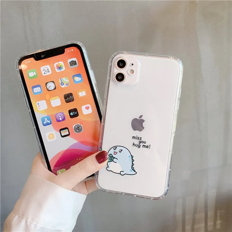Transparent silicone and TPU iPhone case with airbag protection featuring a cute green dinosaur design.