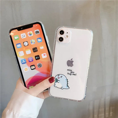 Transparent silicone and TPU iPhone case with airbag protection featuring a cute green dinosaur design.