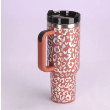 40oz stainless steel tumbler with handle and straw in various colour options showing tapered shape and spill-proof lid