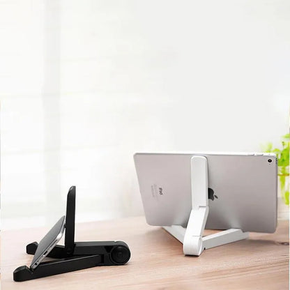 Black foldable tablet holder open in landscape mode holding a tablet, showing side buttons and non-slip base.
