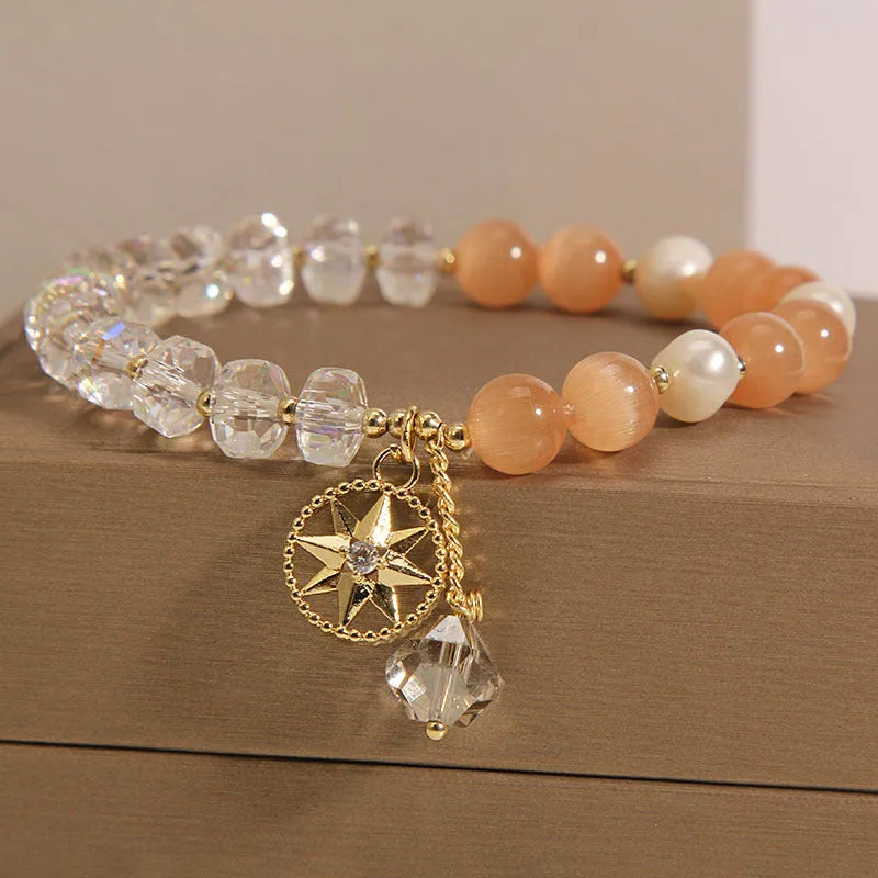 Orange eight Awn star bracelet with gold-plated inlay and artificial gemstones