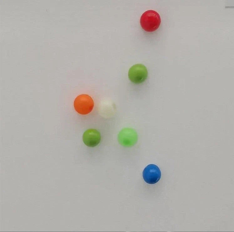 Colorful, luminous stress relief balls with a sticky surface for bouncing, squeezing, and sticking to surfaces