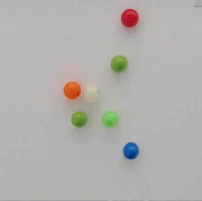Colorful, luminous stress relief balls with a sticky surface for bouncing, squeezing, and sticking to surfaces