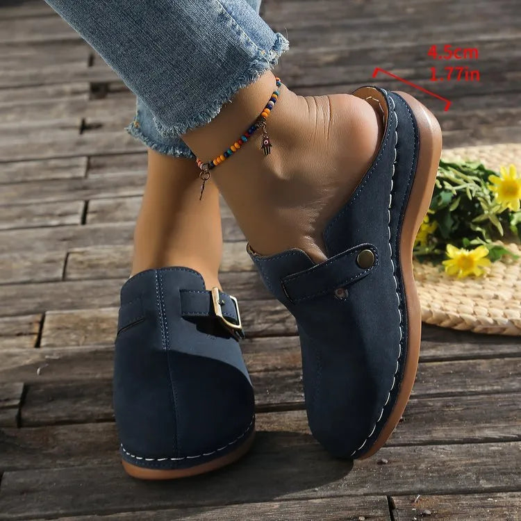 Women's casual wedge slippers in cloth with a rubber sole, shown in light brown colour.