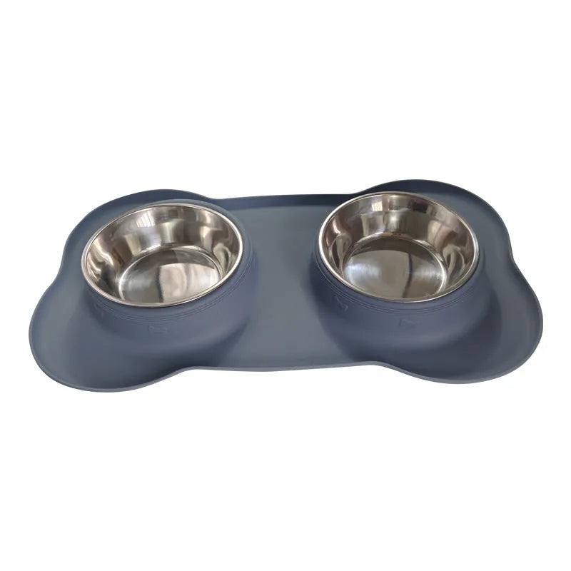 Large silicone dog bowl with stainless steel insert in five colour options on kitchen floor