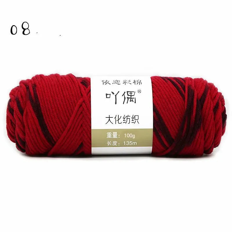 Eight strands of gradient milk cotton wool in a ball, showing multiple colour options for hand knitting.