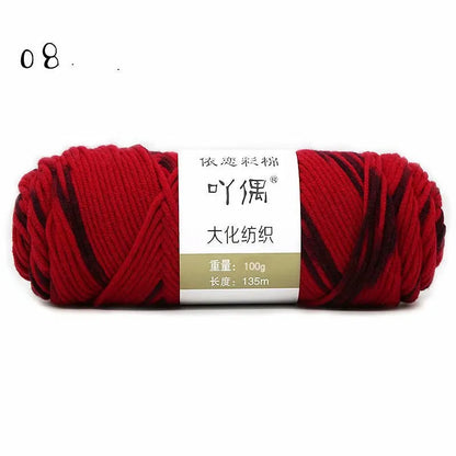 Eight strands of gradient milk cotton wool in a ball, showing multiple colour options for hand knitting.