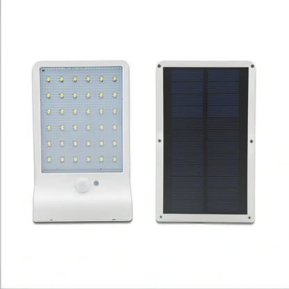 Solar garden light with 36 LED array in black or white finish showing integrated solar panel