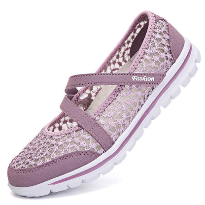 Women's beige lace-up casual flat shoes with a breathable mesh upper and round toe.