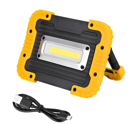 LED camping lantern with rotatable support showing USB ports and battery indicator