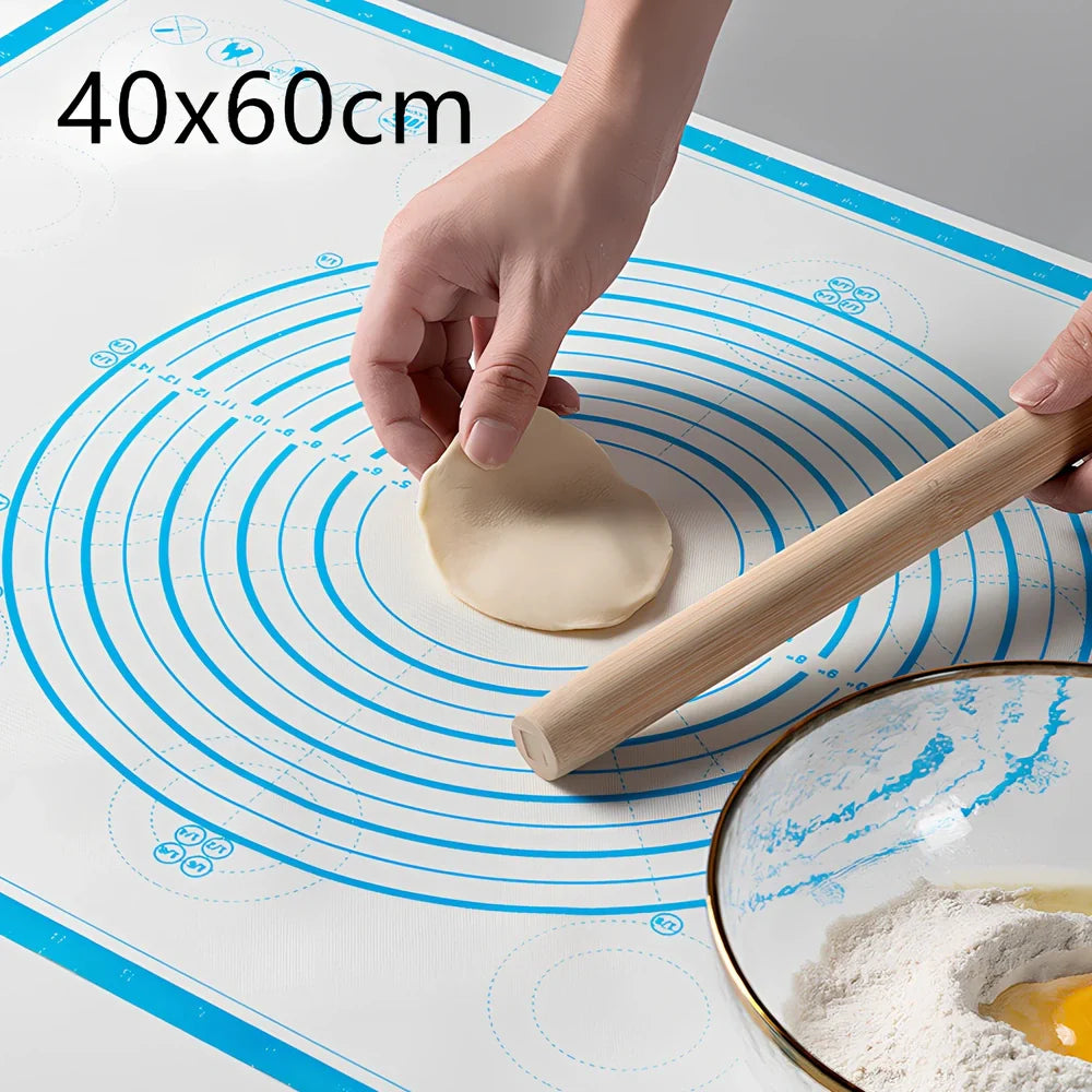 40x60cm black silicone baking mat with measurement guides on kitchen counter