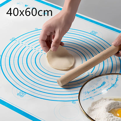 40x60cm black silicone baking mat with measurement guides on kitchen counter