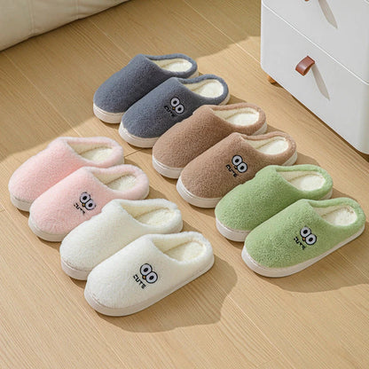 Stylish and cozy cartoon-inspired slippers with plush material and non-slip rubber soles, perfect for keeping feet warm and comfortable at home.