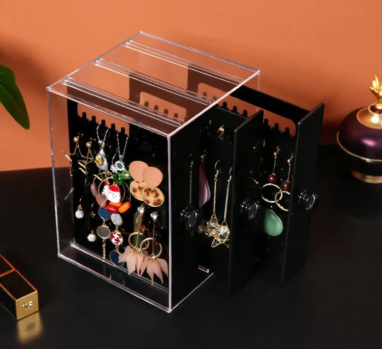 Clear acrylic cosmetic storage box showing makeup organisation with dimensions 13.5x13x24.7 cm