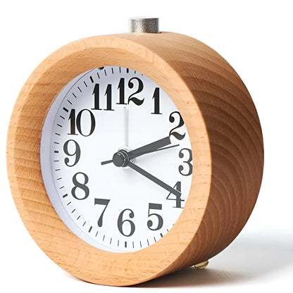 Solid beech wood analog alarm clock with silent snooze on a wooden bedside table