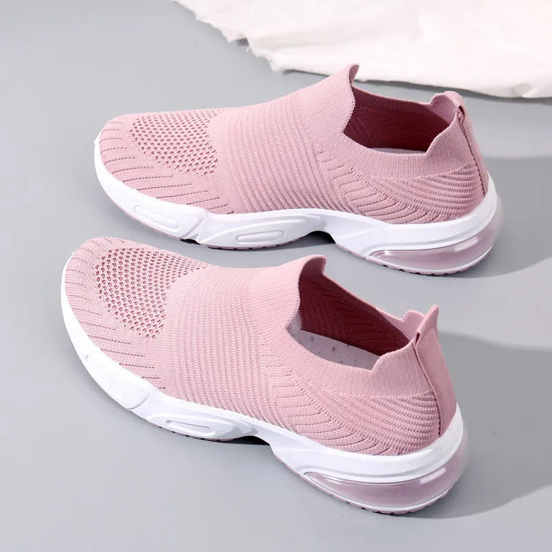 Slip-on breathable mesh sock shoes with a low-top design and PVC sole, shown in a neutral colour.