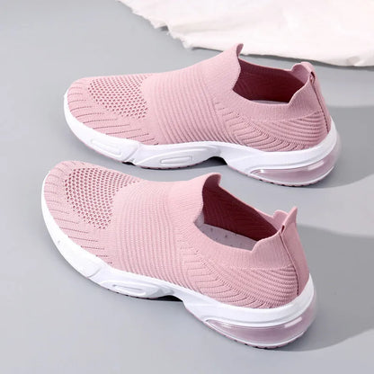 Slip-on breathable mesh sock shoes with a low-top design and PVC sole, shown in a neutral colour.