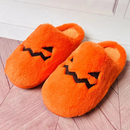 Cozy pumpkin-shaped slippers in orange color with plush fabric and non-slip sole for comfortable indoor wear